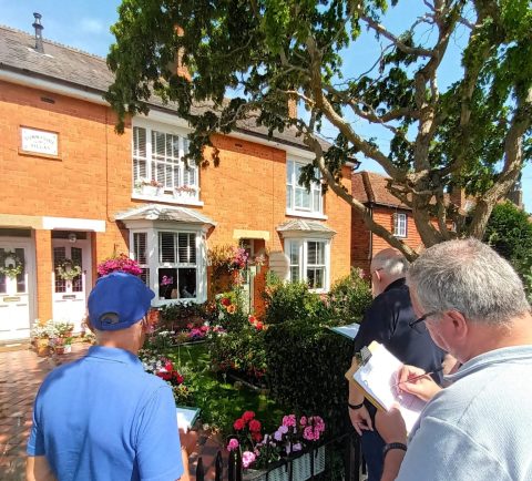 Award ceremony at the front garden competition, with residents and councillors celebrating